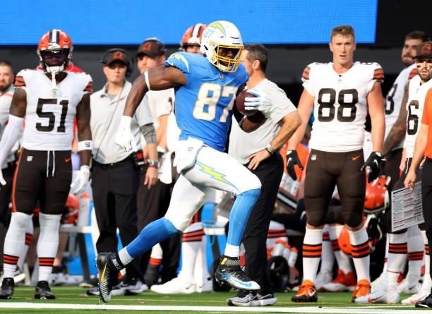 Jared Cook of the Los Angeles Chargers runs down the sidelines after his catch during a 47-42 win over the Cleveland Browns at SoFi Stadium on...