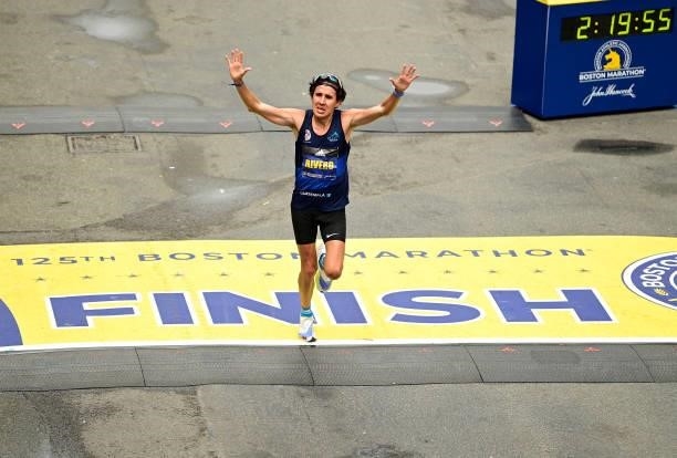 Luis Carlos Rivero reacts as he crosses the finish line during the 125th Boston Marathon on October 11, 2021 in Boston, Massachusetts.