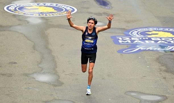 Luis Carlos Rivero reacts as he crosses the finish line during the 125th Boston Marathon on October 11, 2021 in Boston, Massachusetts.