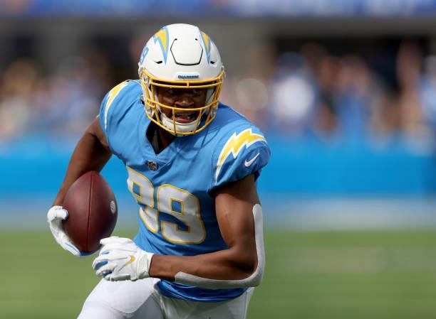 Donald Parham of the Los Angeles Chargers runs in for a touchdown after his catch during a 47-42 win over the Cleveland Browns at SoFi Stadium on...