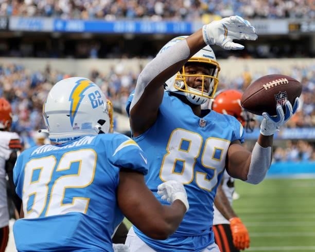 Donald Parham of the Los Angeles Chargers celebrates his touchdown with Stephen Anderson during a 47-42 win over the Cleveland Browns at SoFi Stadium...