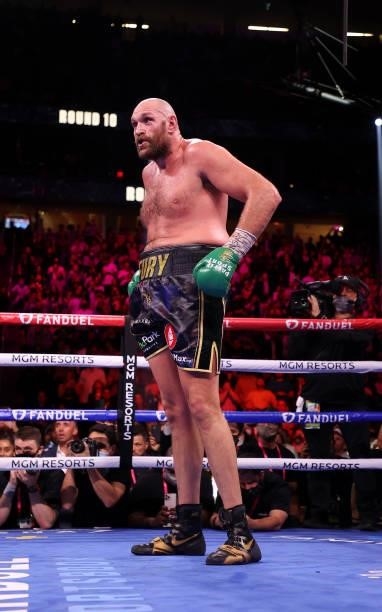 Tyson Fury looks on in a neutral corner after knocking down Deontay Wilder during their WBC heavyweight championship at T-Mobile Arena on October 09,...