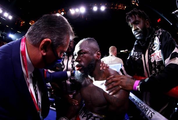 Deontay Wilder receives medical attention in his corner after being knocked out by Tyson Fury in the 11th round in their WBC heavyweight title fight...