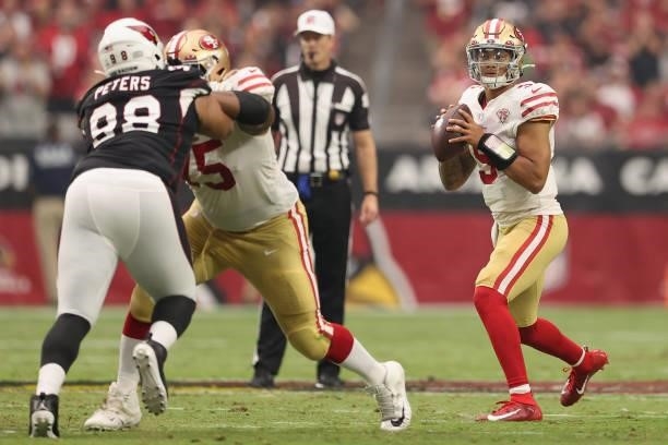 Quarterback Trey Lance of the San Francisco 49ers throws a pass during the NFL game at State Farm Stadium on October 10, 2021 in Glendale, Arizona....