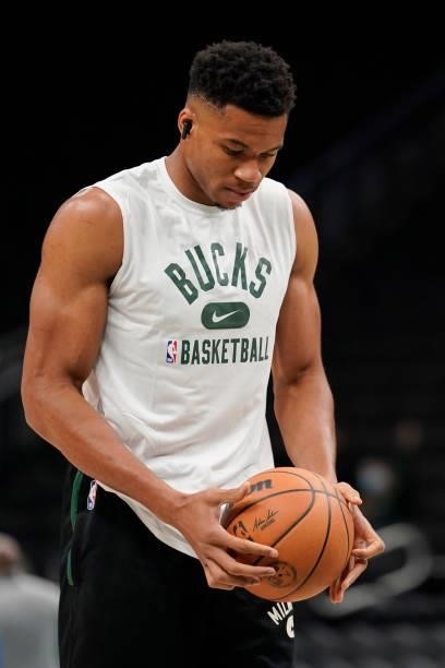 Giannis Antetokounmpo of the Milwaukee Bucks works out before a preseason game against the Oklahoma City Thunder at Fiserv Forum on October 10, 2021...