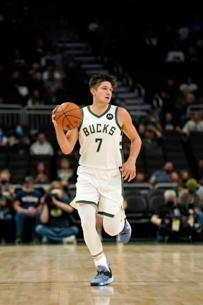 Grayson Allen of the Milwaukee Bucks dribbles the ball against the Oklahoma City Thunder in the first half during a preseason game at Fiserv Forum on...