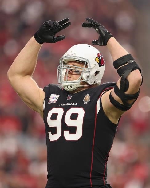 Defensive end J.J. Watt of the Arizona Cardinals reacts to fans during the NFL game at State Farm Stadium on October 10, 2021 in Glendale, Arizona....