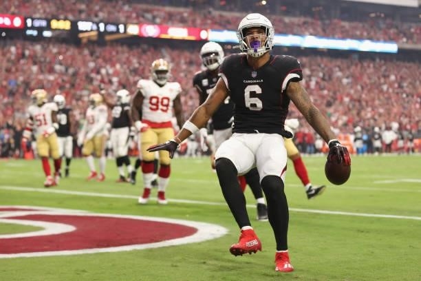 Running back James Conner of the Arizona Cardinals celebrates after scoring a one-yard rushing touchdown against the San Francisco 49ers during the...