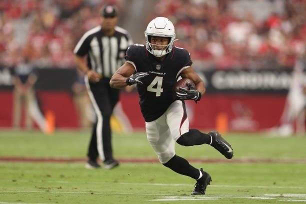 Wide receiver Rondale Moore of the Arizona Cardinals runs with the football after a reception during the NFL game at State Farm Stadium on October...