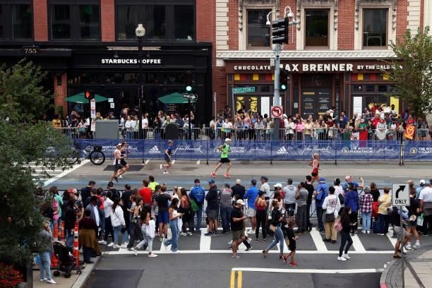 Runners make their way down Boylston Street during the 125th Boston Marathon on October 11, 2021 in Boston, Massachusetts.