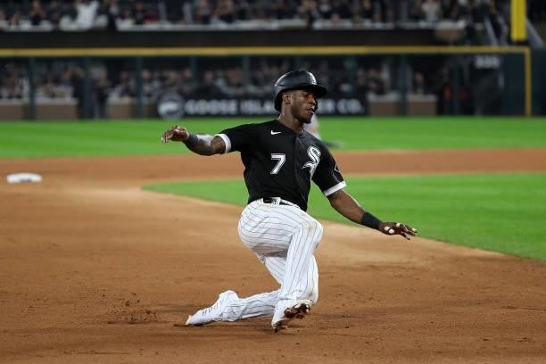 Tim Anderson of the Chicago White Sox slides into third base during game three of the American League Division Series against the Houston Astros at...