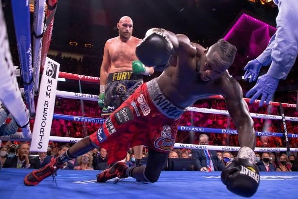 Deontay Wilder is knocked out by Tyson Fury in the 11th round during their WBC heavyweight title fight at T-Mobile Arena on October 09, 2021 in Las...