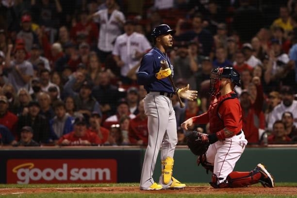 Wander Franco of the Tampa Bay Rays reacts after being called out on strikes in the first inning against the Boston Red Sox during Game 4 of the...