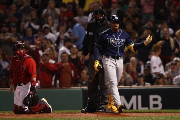 Wander Franco of the Tampa Bay Rays reacts after being called out on strikes in the first inning against the Boston Red Sox during Game 4 of the...