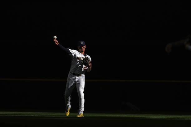 Willy Adames of the Milwaukee Brewers participates in warmups prior to game one of the National League Division Series against the Atlanta Braves at...