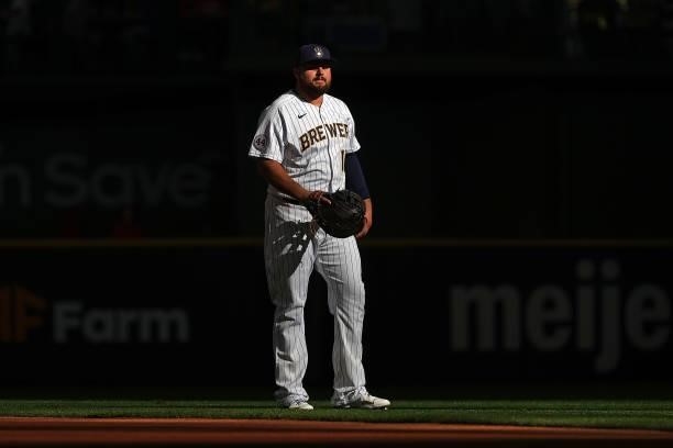 Rowdy Tellez of the Milwaukee Brewers participates in warmups prior to game one of the National League Division Series against the Atlanta Braves at...