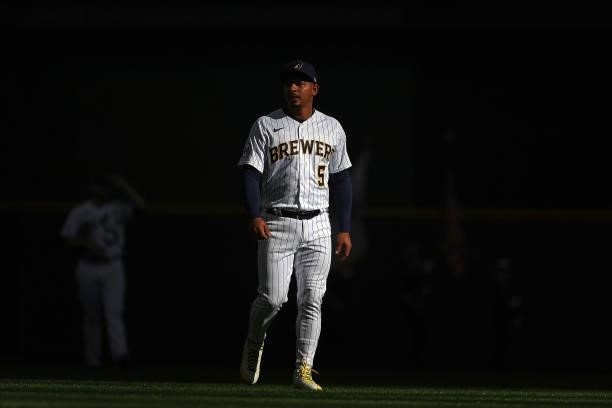 Eduardo Escobar of the Milwaukee Brewers participates in warmups prior to game one of the National League Division Series against the Atlanta Braves...