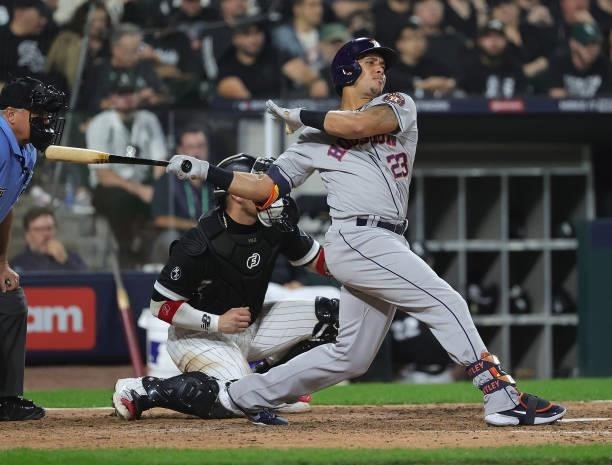 Michael Brantley of the Houston Astros bats against the Chicago White Sox at Guaranteed Rate Field on October 10, 2021 in Chicago, Illinois. The...