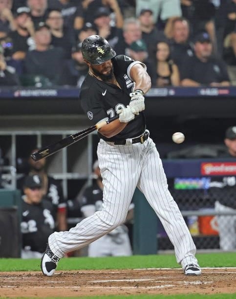 Jose Abreu of the Chicago White Sox bats against the Houston Astros at Guaranteed Rate Field on October 10, 2021 in Chicago, Illinois. The White Sox...