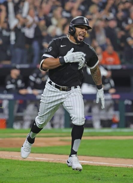 Leury Garcia of the Chicago White Sox celebrates a home run as he runs the bases against the Houston Astros at Guaranteed Rate Field on October 10,...