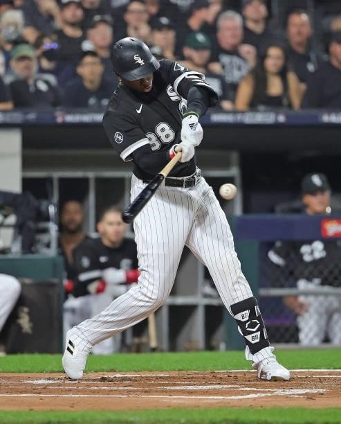 Luis Robert of the Chicago White Sox bats against the Houston Astros at Guaranteed Rate Field on October 10, 2021 in Chicago, Illinois. The White Sox...