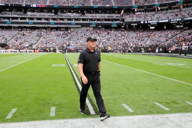 Head coach John Gruden of the Las Vegas Raiders walks on the field before a game against the Chicago Bears at Allegiant Stadium on October 10, 2021...