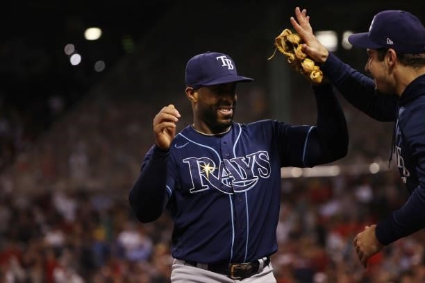 Yandy Diaz of the Tampa Bay Rays celebrates after throwing out a runner in the sixth inning against the Boston Red Sox during Game 4 of the American...