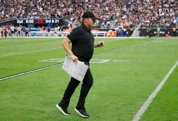 Head coach John Gruden of the Las Vegas Raiders leaves the field after the first half against the Chicago Bears at Allegiant Stadium on October 10,...