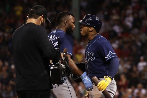Wander Franco congratulates Randy Arozarena of the Tampa Bay Rays on his RBI double in the eighth inning during Game 4 of the American League...