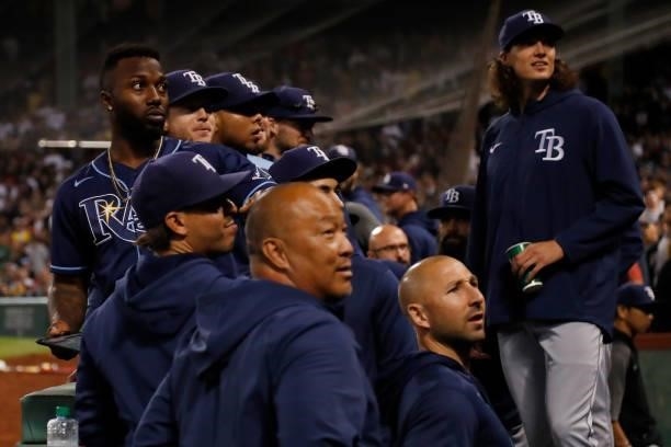 Tampa Bay Rays player react after fans threw drinks into their dugout during Game 4 of the American League Division Series against the Boston Red Sox...