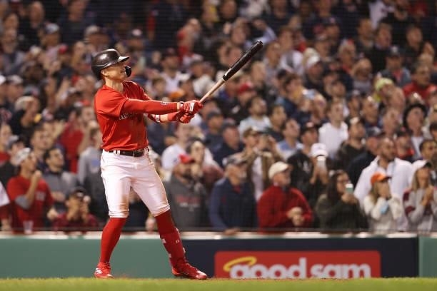 Enrique Hernandez of the Boston Red Sox hits the game winning sacrifice fly in the ninth inning against the Tampa Bay Rays during Game 4 of the...