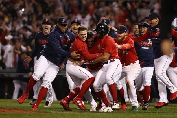 Enrique Hernandez of the Boston Red Sox celebrates with teammates after they defeated the Tampa Bay Rays 6 to 5 during Game 4 of the American League...
