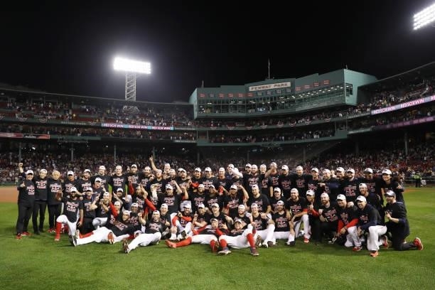 The Boston Red Sox celebrate their 6 to 5 win over the Tampa Bay Rays during Game 4 of the American League Division Series at Fenway Park on October...