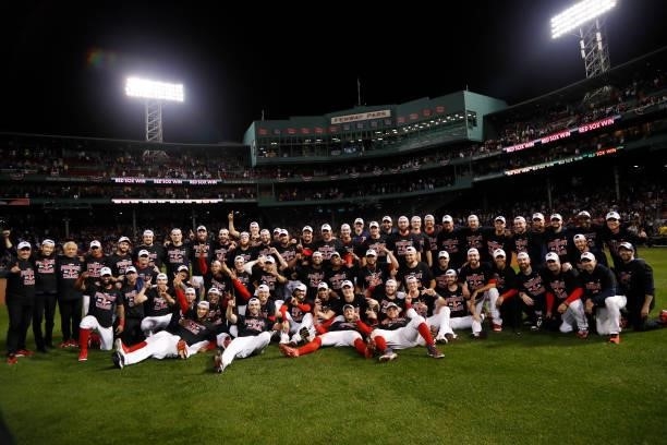 The Boston Red Sox celebrate their 6 to 5 win over the Tampa Bay Rays during Game 4 of the American League Division Series at Fenway Park on October...