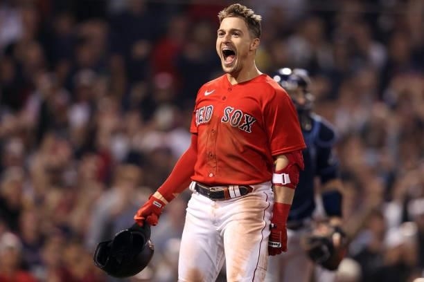 Enrique Hernandez of the Boston Red Sox celebrates his game winning sacrifice fly in the ninth inning against the Tampa Bay Rays during Game 4 of the...