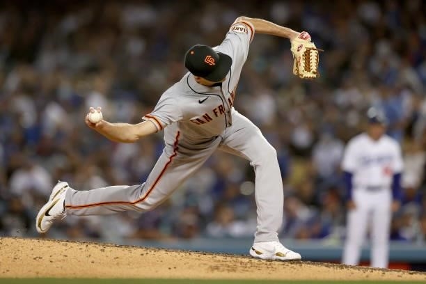 Tyler Rogers of the San Francisco Giants pitches against the Los Angeles Dodgers during the sixth inning in game 3 of the National League Division...