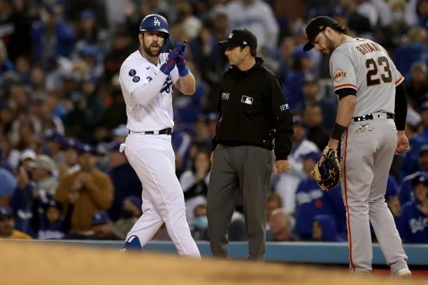 Steven Souza Jr. #18 of the Los Angeles Dodgers reacts after his single against the San Francisco Giants during the seventh inning in game 3 of the...
