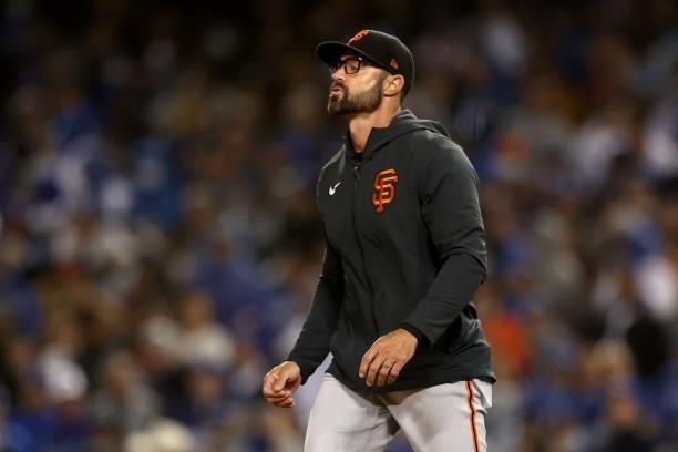 Manager Gabe Kapler of the San Francisco Giants makes a pitching change in the seventh inning of game 3 of the National League Division Series...