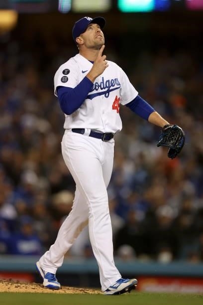 Blake Treinen of the Los Angeles Dodgers reacts after a strikeout against the San Francisco Giants during the eighth inning in game 3 of the National...