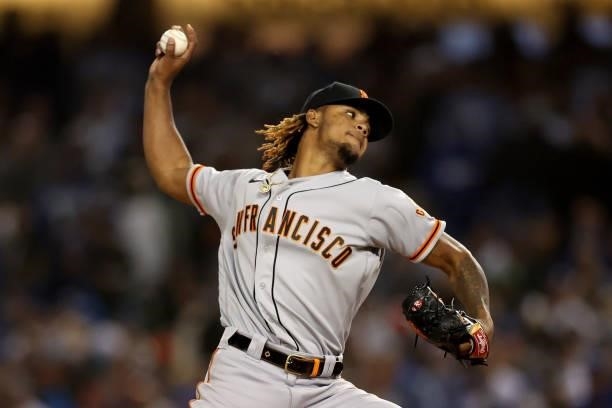 Camilo Doval of the San Francisco Giants pitches against the Los Angeles Dodgers during the eighth inning in game 3 of the National League Division...
