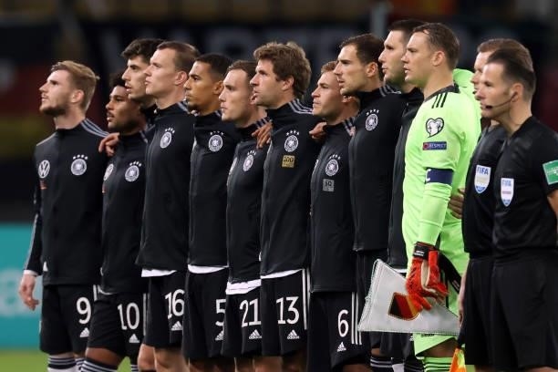 Players of Germany sing their national anthem prior to the 2022 FIFA World Cup Qualifier match between North Macedonia and Germany at National Arena...