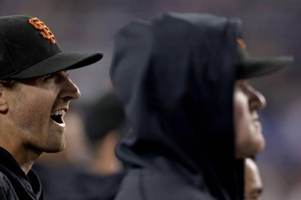 Kevin Gausman and Logan Webb of the San Francisco Giants look on during the ninth inning in game 3 of the National League Division Series against the...