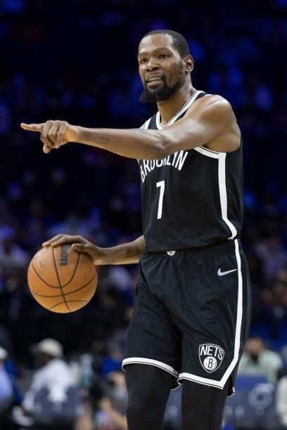 Kevin Durant of the Brooklyn Nets dribbles the ball against the Philadelphia 76ers at the Wells Fargo Center on October 11, 2021 in Philadelphia,...
