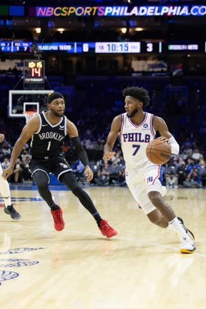 Isaiah Joe of the Philadelphia 76ers dribbles the ball against Bruce Brown of the Brooklyn Nets at the Wells Fargo Center on October 11, 2021 in...