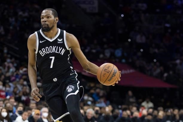 Kevin Durant of the Brooklyn Nets dribbles the ball against the Philadelphia 76ers at the Wells Fargo Center on October 11, 2021 in Philadelphia,...