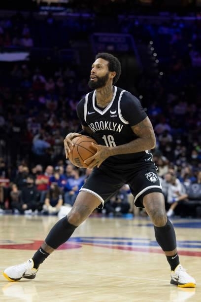 James Johnson of the Brooklyn Nets controls the ball against the Philadelphia 76ers at the Wells Fargo Center on October 11, 2021 in Philadelphia,...