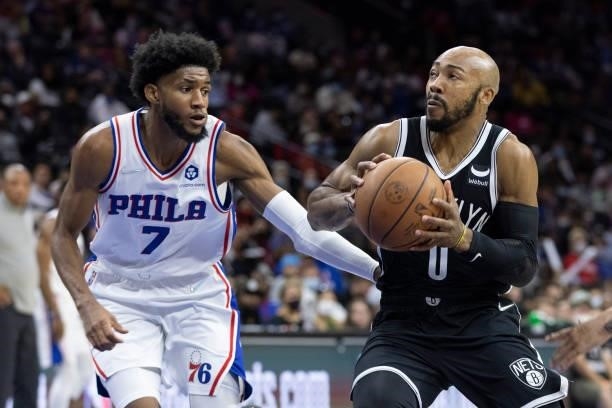 Jevon Carter of the Brooklyn Nets controls the ball against Isaiah Joe of the Philadelphia 76ers at the Wells Fargo Center on October 11, 2021 in...