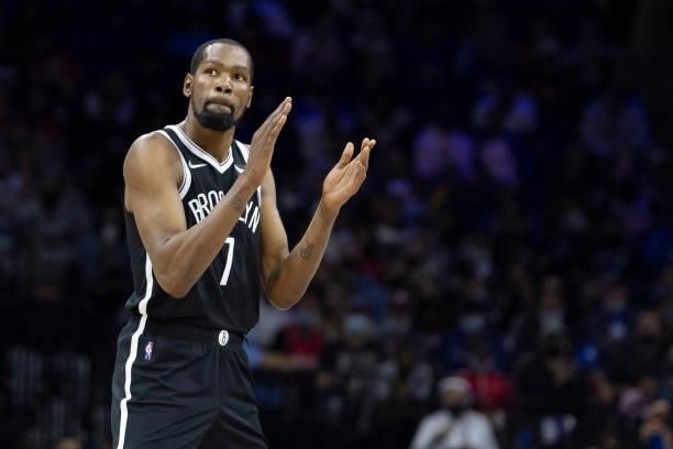 Kevin Durant of the Brooklyn Nets reacts against the Philadelphia 76ers at the Wells Fargo Center on October 11, 2021 in Philadelphia, Pennsylvania....