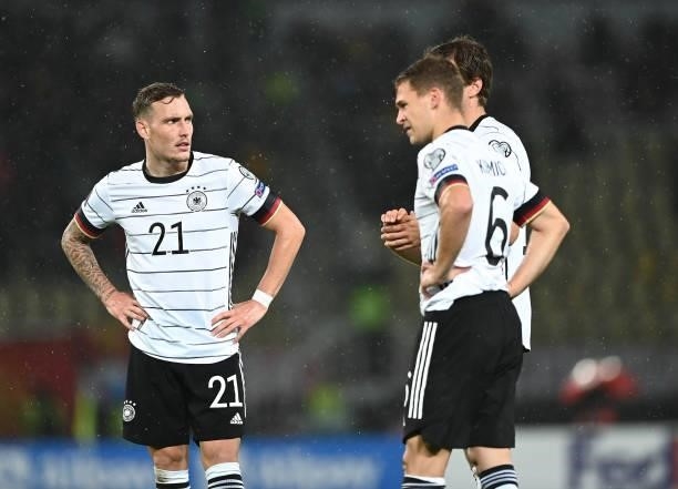 David Raum , Joshua Kimmich and Thomas Mueller of Germany look on during the 2022 FIFA World Cup Qualifier match between North Macedonia and Germany...