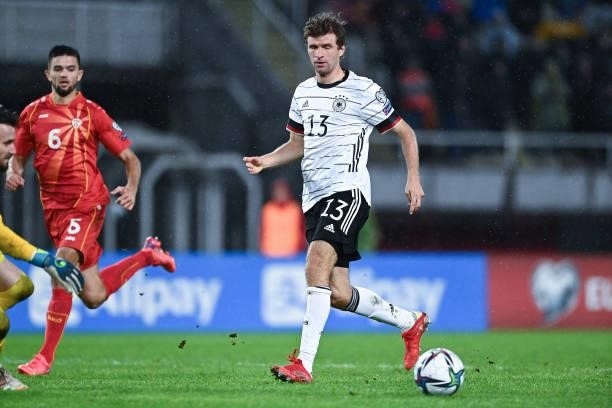 Thomas Mueller of Germany runs with the ball during the 2022 FIFA World Cup Qualifier match between North Macedonia and Germany at National Arena...
